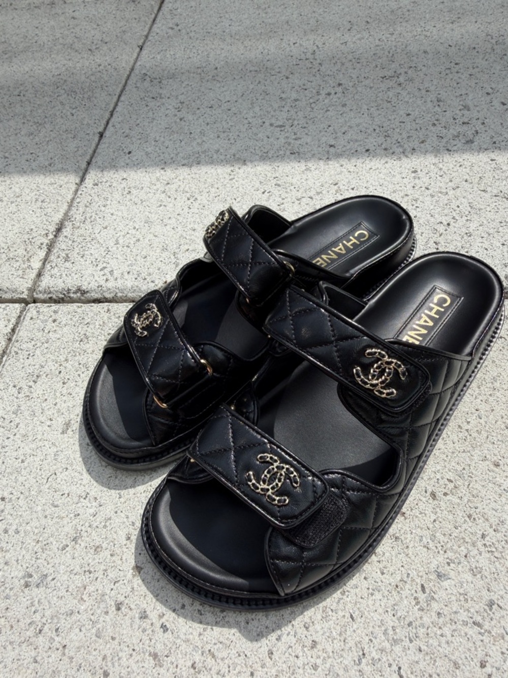 Authentic CHANEL Black Quilted Double-Strap Slide Sandals with Gold CC